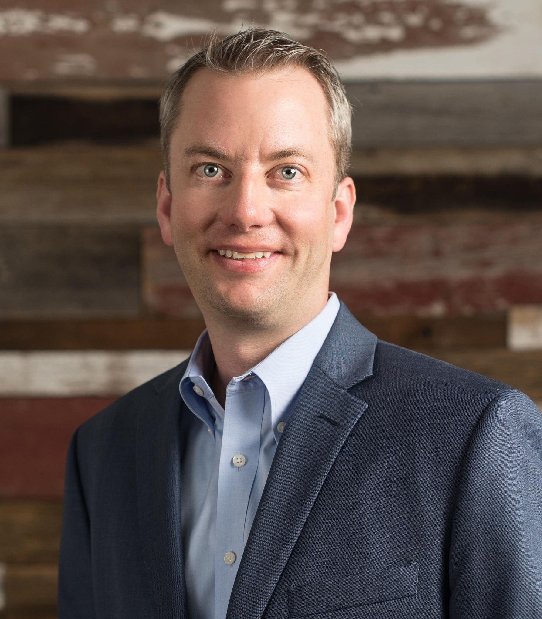 Professional headshot of Josh St. Romain